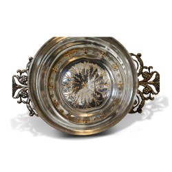 Decorated metal tea strainer.