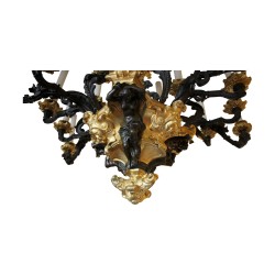 Grand lustre Napoléon III en bronze patiné noir et or. France