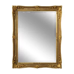 Régence mirror with gilt wood frame and bevelled glass.