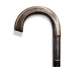 Cane with silver handle and wooden handle.