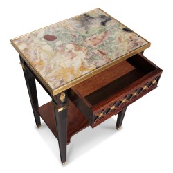 Table in black varnished mahogany veneer decorated with bronzes …