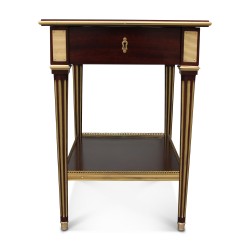Table in varnished mahogany veneer decorated with gold-finish bronzes …