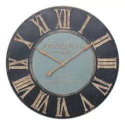Wall clock with Roman numerals and inscriptions: “…