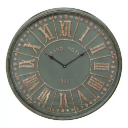 water green wall clock with Roman numerals and …
