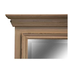 Mirror with limed wood frame.