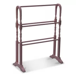 Laundry rack in pink lacquered wood.