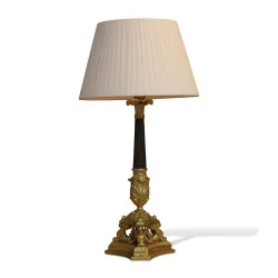 Lampe Empire tripode en bronze doré et colonne noire avec …