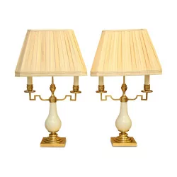 Pair of “JANSEN” lamps in brass and white porcelain. …
