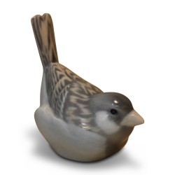 Oiseau “gros-bec casse-noyaux” en porcelaine.