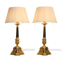 Paire de lampes colonnes Empire tripodes en bronze doré et …