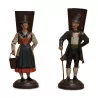 Une paire de personnages suisses en métal peint "Couple de vigneron" - Moinat - Brienz