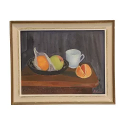 Still life representing oranges and a cup.