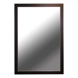Mirror with a wooden frame.