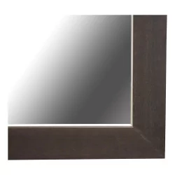 Mirror with a wooden frame.