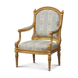 Pair of Louis XVI armchairs in carved and gilded wood...