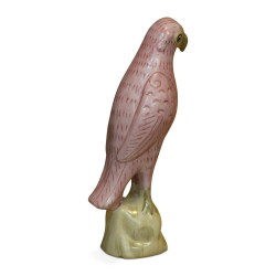 Perroquet rose en porcelaine.