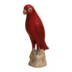 Parrot in red porcelain.