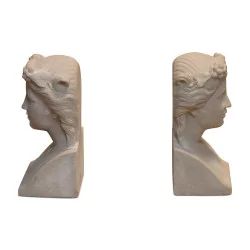 Pair of bookends Busts of a woman in beige carved stone.