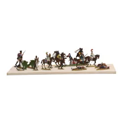 Plate of toy soldiers 3 horsemen, 5 soldiers on foot, 4 …