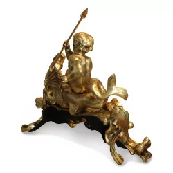 Paar Bügelböcke mit Putten und Drachen in vergoldeter Bronze.