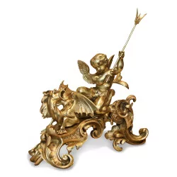 Paire de chenets au Putti et au dragon en bronze doré.