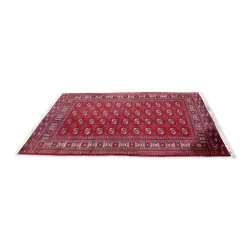 Oriental rug in red tones.