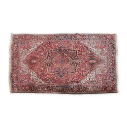 Oriental rug in red tones of Persian origin with …