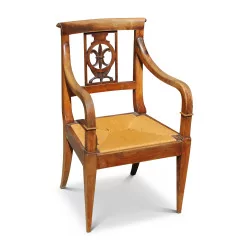 strohbezogener Directoire-Sessel mit Fleur-de-Lys-Palme. Um 1820. …