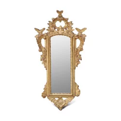 镜子，带雕花镀金木框。意大利 。