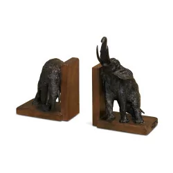 Pair of wooden and bronze bookends representing …