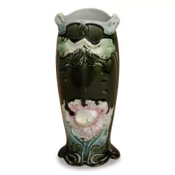 slip vase with floral decorations. France.