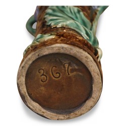 slip vase with floral decorations. France.