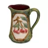 slip pitcher decorated with cherries. - Moinat - Chinaware, Porcelain