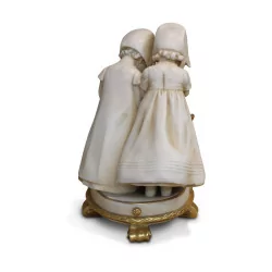 Statuette en porcelaine "2 Enfants et leur chat"