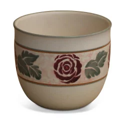 Pot decorated with flowers.
