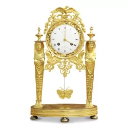 An Empire mantel clock. Marseilles