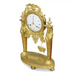 An Empire mantel clock. Marseilles
