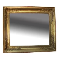 Mirror with grooved frame in gilded wood Empire around 1840 with a …