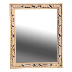 Зеркало в резной и расписной деревянной раме.