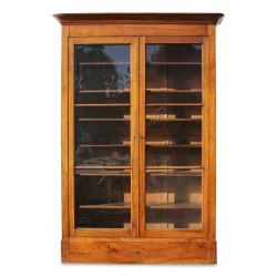 Large walnut showcase. Swiss.