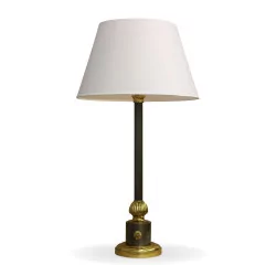 A stylized column lamp and white lampshade.