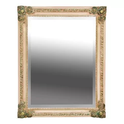 Mirror with carved and painted wooden frame.