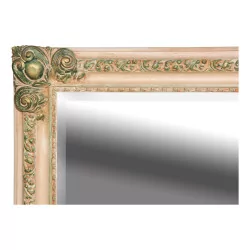Mirror with carved and painted wooden frame.