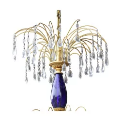 crystal chandelier in gilded bronze and blue glass.