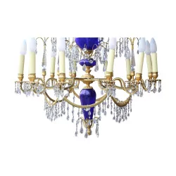 crystal chandelier in gilded bronze and blue glass.