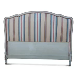 molded Louis XV headboard, covered with striped fabric …
