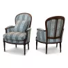Pair of Louis XVI Bergeres in walnut covered with lampas … - Moinat - Armchairs