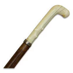 Cane with a carved bone cross.