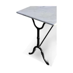A rectangular white marble bistro table.