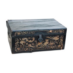 A \"Chinese\" trunk in black leather paper and wood
